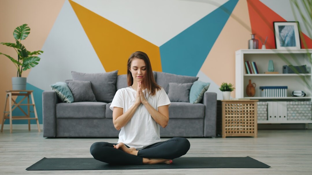 woman doing yoga at home