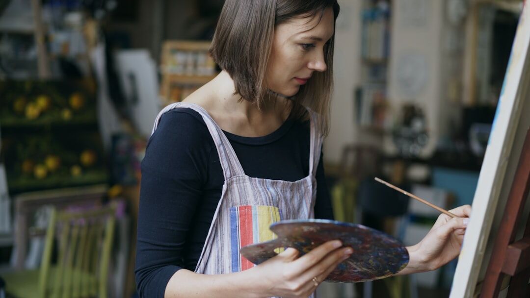 person painting in studio