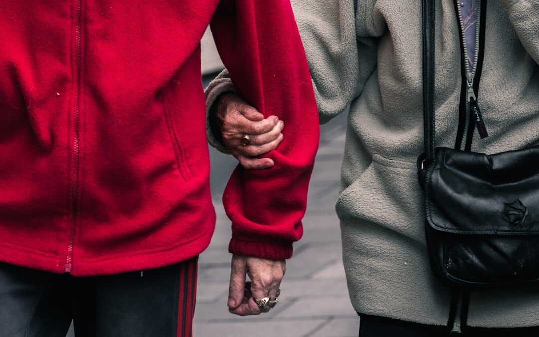singer and model holding hands