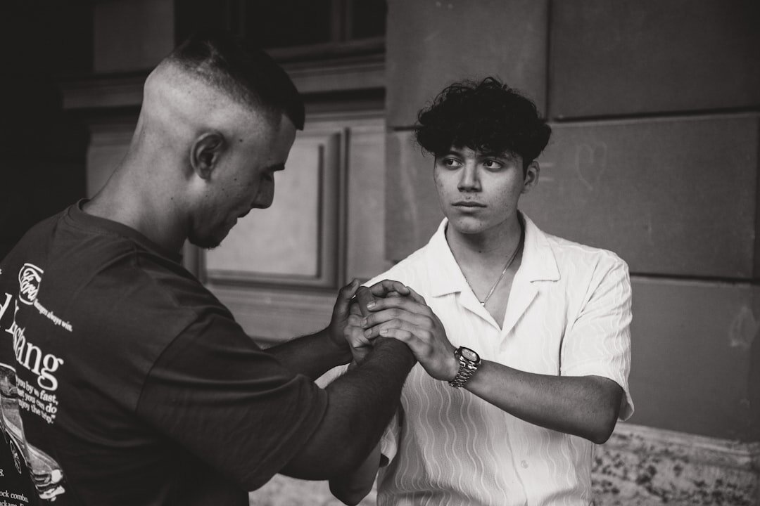 singer and model holding hands