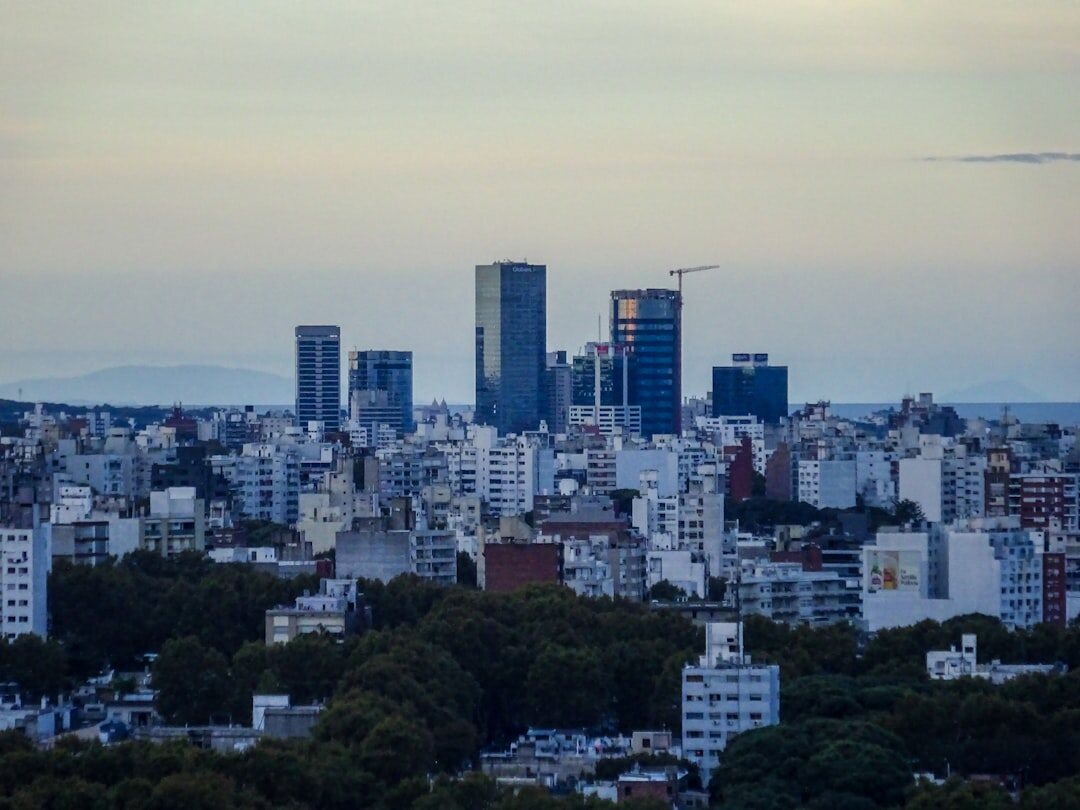 Montevideo city skyline at dusk with warm lights
